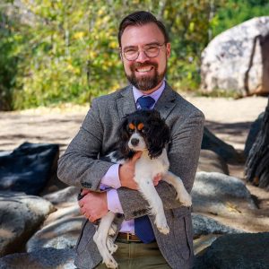 Dr. Daughtry with his dog at State of the Heart Vet